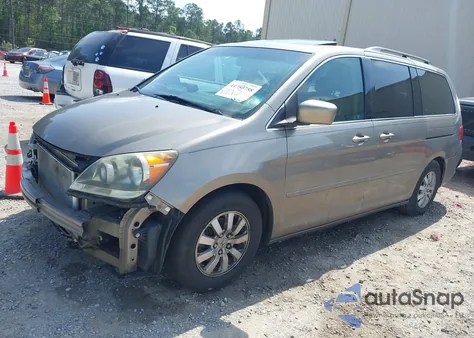 2010 Honda Odyssey Ex-L z USA, uszkodzony, nr VIN 5FNRL3H76AB065214